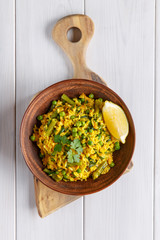 Rice cooked with vegetables, herbs and spice. Vegan cuisine. Healthy vegetarian food concept.