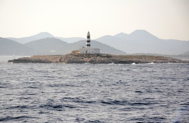 Fototapeta premium Lighthouse and the Hills