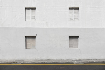 Windows with shutters on the wall