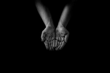 Helping hand concept, Man's hands palms up, giving care and support, reaching out