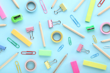 School supplies on colorful background