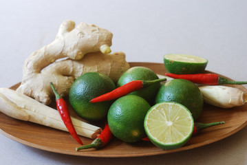 Set of asian spices: kaffir limes, lemongrass, bird's eye chilis, ginger. Suitable for tom yum and hot pot making.