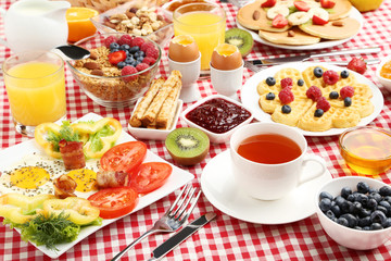 Fresh and tasty breakfast on kitchen table