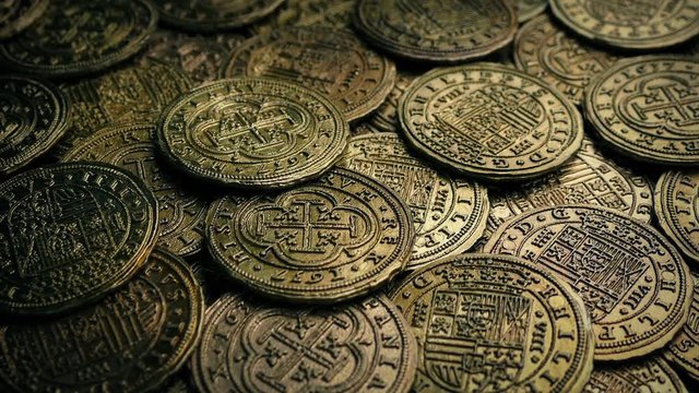 Many Old Coins Moving Shot