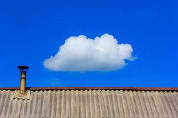 the roof is covered with slate from the chimney and a white cloud in the blue sky, minimal art