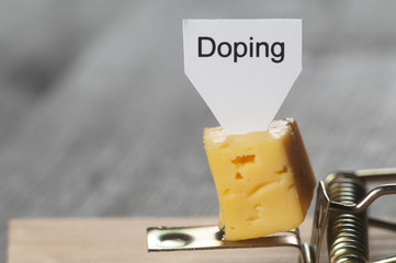 Doping sign on a cheese in mouse trap