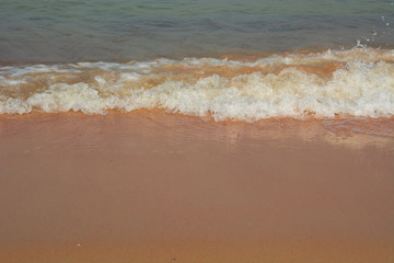 Sea soft  wave on the white sand  beach close up