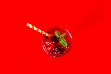 One alcoholic cocktail in a transparent glass