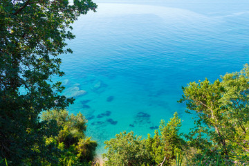 Fototapeta na wymiar View from above to the turquoise water in Adriatic sea at Montenegro, nature landscape, vacations to the summer paradise