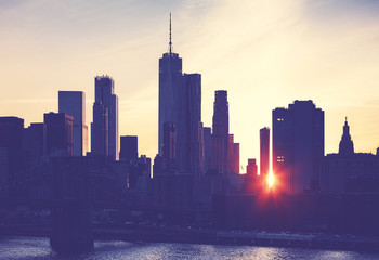 Obraz premium Vintage toned New York City skyline silhouette at sunset, USA.