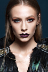 Beautiful young model with fashion make up, perfect skin, stylish look. Trendy lip color