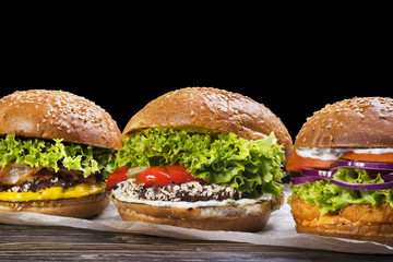 Craft beef burgers on wood