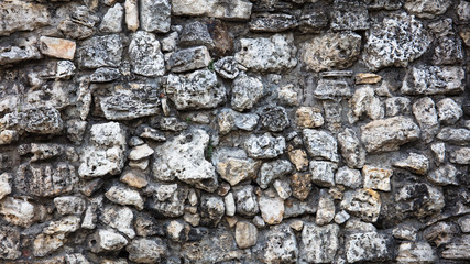 Wall of stones as an abstract background