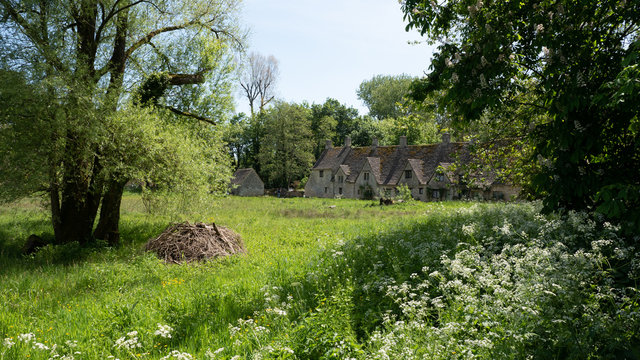Old English weavers cottages at Arlington row in the village of Bibury England 