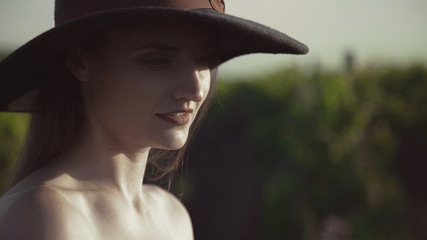  Portrait of an elegant girl. The lady in the hat.