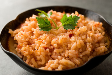 Homemade Tomato Rice with Parsley in Ceramic Bowl / Pilav / Pilaf.