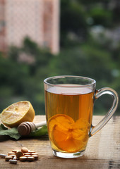 Cup of tea with lemon. Healthy theme.