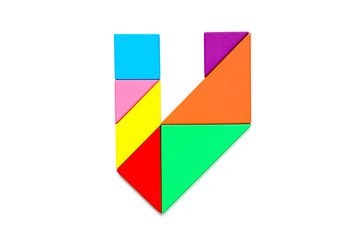 Obraz premium Color tangram puzzle in english alphabet v shape on white background