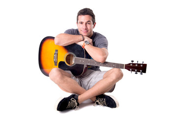 Obraz premium young man playing the guitar