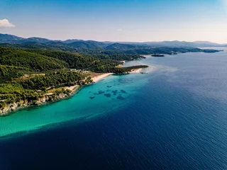 Aerial view of rocks and blue sea lagoon in Greece