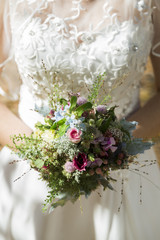 Bride with wedding bouquet