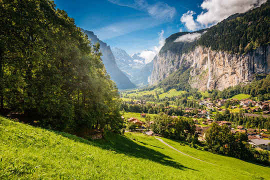 Vivid view of alpine village. Location place Swiss alps, Lauterbrunnen valley.