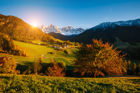 Sunny day in St. Magdalena village. Location place Funes valley, Dolomiti Alps.
