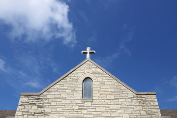 Cross on Church Steeple of Old Christian Stone Temple