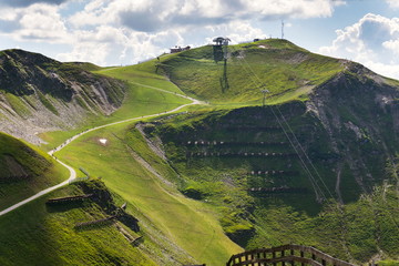 Bikers trail to Schattberg-Ost mountain cable car station, Saalbach-Hinterglemm, Alps, Austria