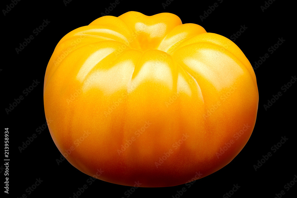Poster big delicious single yellow tomato isolated on black background with clipping path - Posters