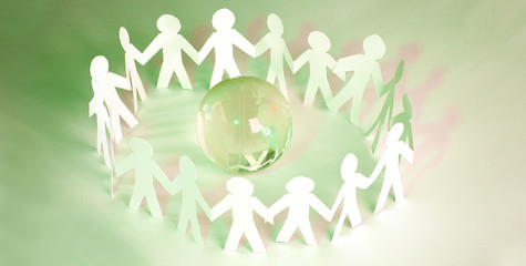 business concept.a large team of paper men standing around the