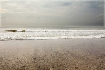 North Sea beach in Denmark at cloudy day.