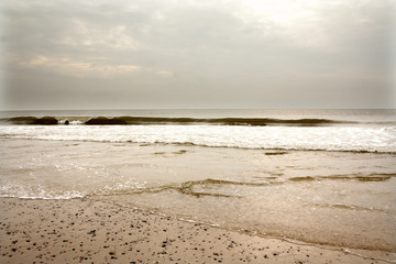 North Sea beach in Denmark at cloudy day.