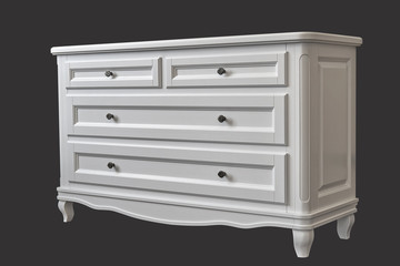 White wooden chest of drawers isolated on dark grey
