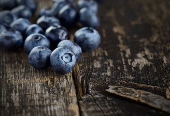 Fresh blueberries  on а wooden table