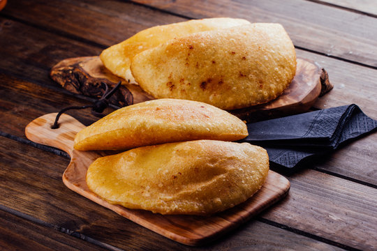Fried empanadas, stuffed with chicken and meat