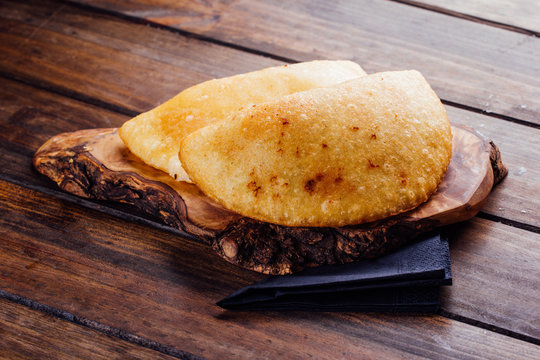 Fried empanadas, stuffed with chicken and meat