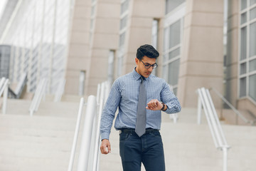 Fototapeta premium businessman in a summer city