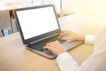 Female hands typing on a laptop at office.Working business Concept Image.