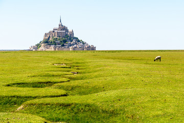 The Mont Saint-Michel tidal island, situated in France on the limit between Normandy and Brittany,...