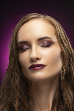 Beautiful Girl Model Beauty Close-up Portrait On Pink Black Gradient Background. Healthy Skin