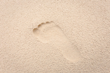 foot print on yellow soft sand texture a bit rough