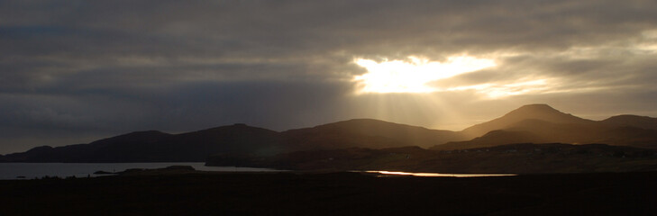 Sun over Scottish Mountains