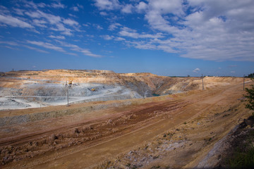 Fototapeta na wymiar Gold and silver ore open pit quarry mining technology with machines