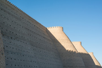 Fototapeta na wymiar Historical walls of Ark fortress in Bukhara, Central Asia