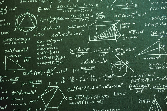 Math on dark green board with many solution