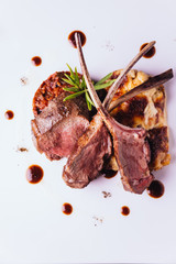 Roasted Australian lamb rack served with ratatouille and country potato.