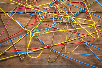 wire hangers on a rustic wood