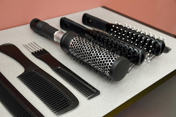 combs and scissors for the hairdresser, tools of the master of hairdressing salon
