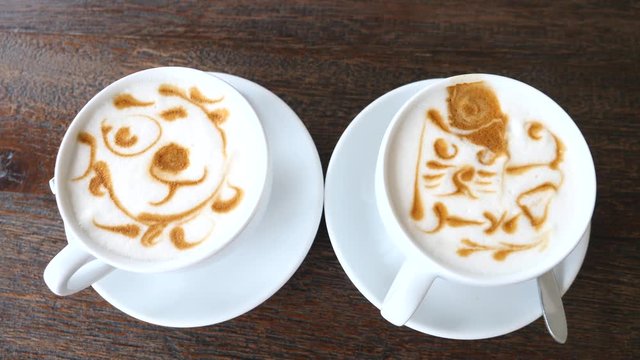 Two Cups Of Coffee With Beautiful Latte Art.